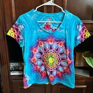 Brand new women’s size, medium, handmade, tie-dye Tshirt.